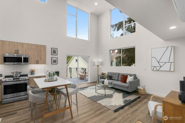 Building Photo - Welcome Home -Modern and Expansive Windows