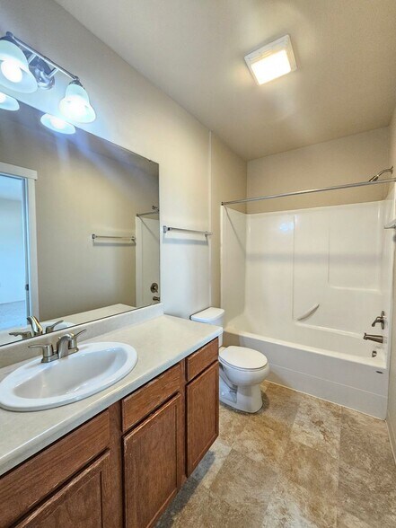 Building Photo - 5207-5207 E Upriver Dr