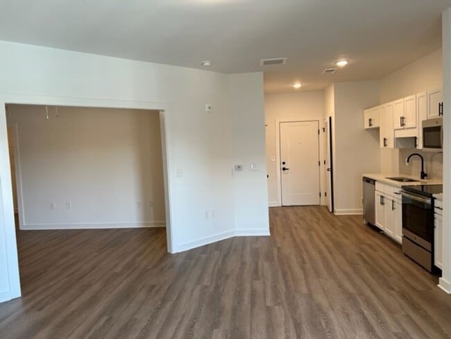 Building Photo - Beautiful New Construction in Gated Community within Minutes to Downtown!