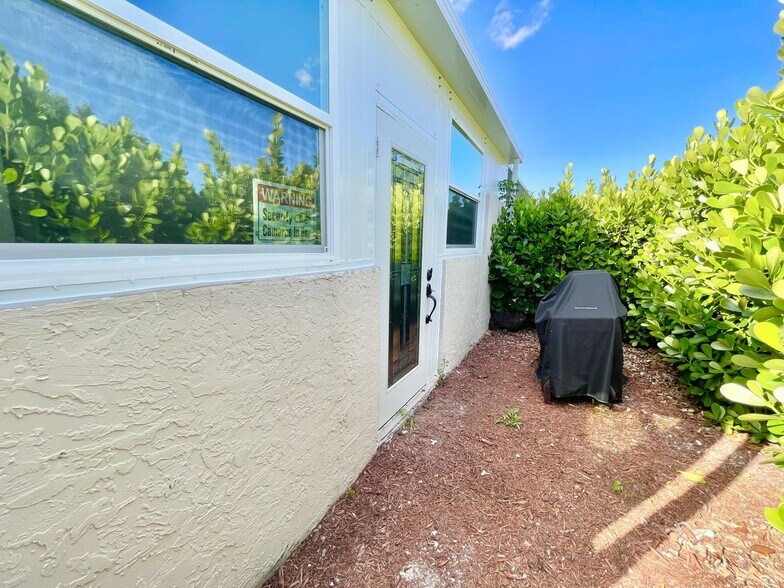 Building Photo - 9663 Boca Gardens Cir N