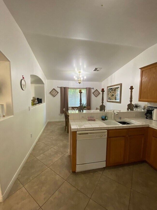 Building Photo - Gated Community of Grand Island in Seven Oaks 2 BD 2 BA Gorgeous House