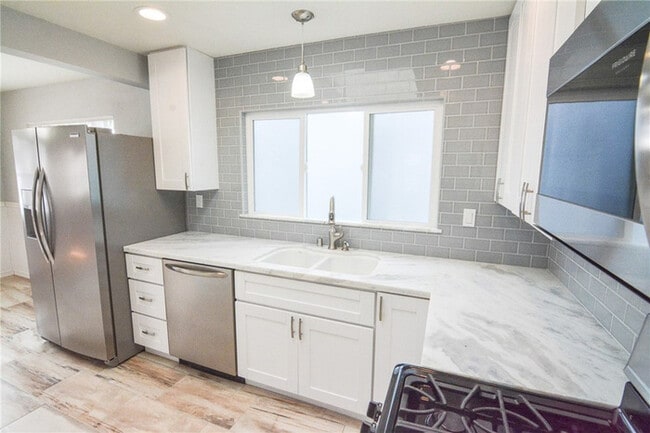 Building Photo - Updated Coastal Home with Studio Unit & Solar in Ocean Beach