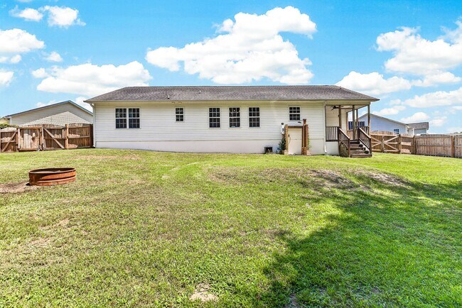Building Photo - Charming Cow Horn Village Home with Outdoor Shower & Fenced Backyard