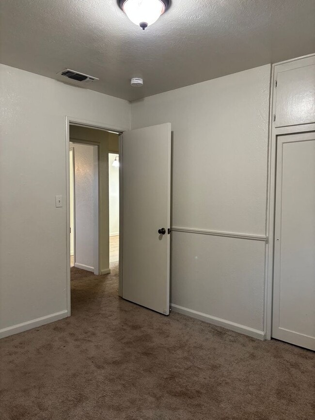 Building Photo - Updated 3 bedroom 2 bathroom home with large backyard, corner lot, close to shopping and schools ...