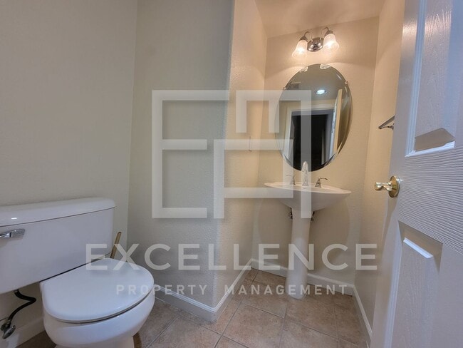 Building Photo - Spacious 3/2.5 Located In Communication Hills, With Two 1 Car Garages, W/D & Large Master Retreat