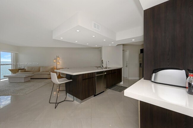 Building Photo - 6767 Collins Ave