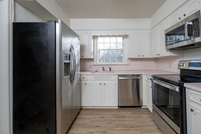 Building Photo - Park Hill Home with Original Details and Updated Kitchen