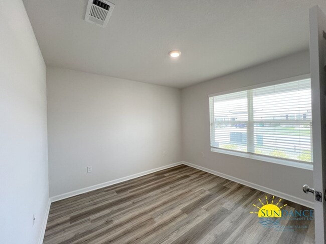 Building Photo - Spacious 4BR Home with Solar Panels & Smart Features in Patriot Ridge with Community Perks!