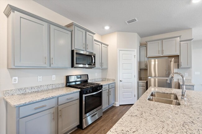 Building Photo - UPCOMING LISTING -WITH LAWNCARE- IN STONEBRIDGE