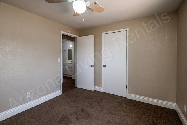 Building Photo - LARGE FENCED YARD WITH DETACHED GARAGE