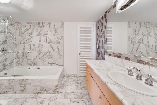 Building Photo - 6423 Collins Ave