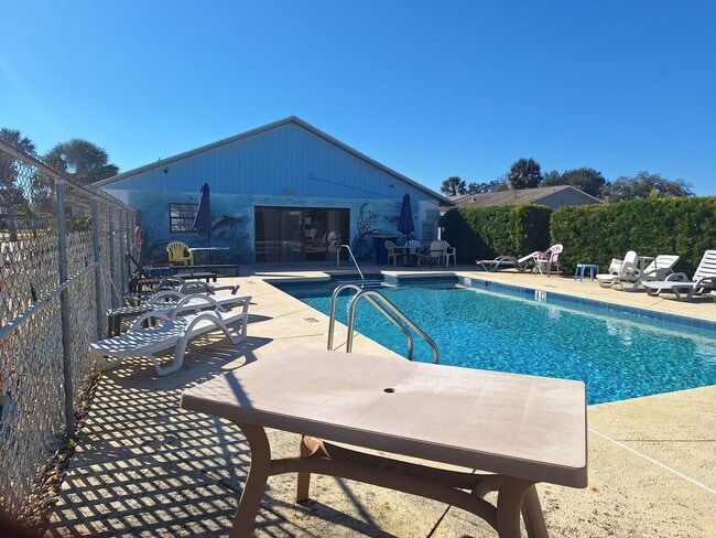 Building Photo - PELICAN COVE WEST 2BR 2BA WITH GARAGE FOR RENT