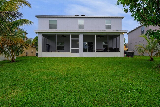 Building Photo - 6147 NW Butterfly Orchid Pl