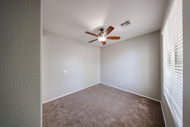 Building Photo - Welcome to this spacious 4 bedroom, 2.5 ba...
