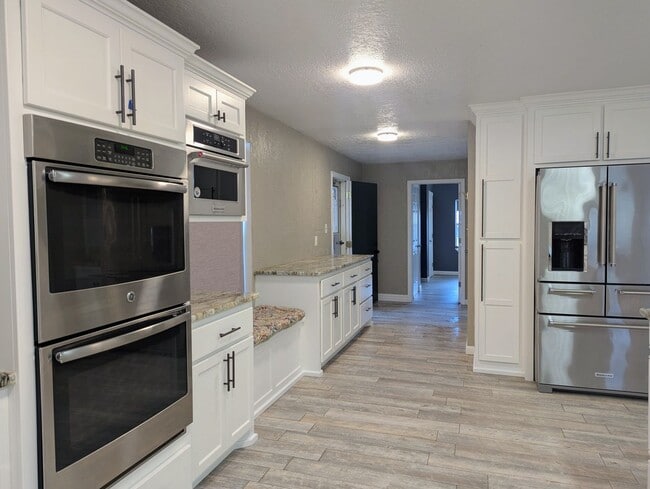 Building Photo - Spacious Noble Home with Open-Concept Kitchen, Storm Shelter & Workshop Space!