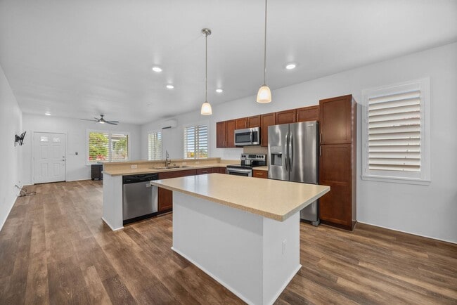 Building Photo - Flexible 6-Month Lease--Solar-Powered Wailuku Home with Ocean views, Fruit Trees, Split AC & Dog-...