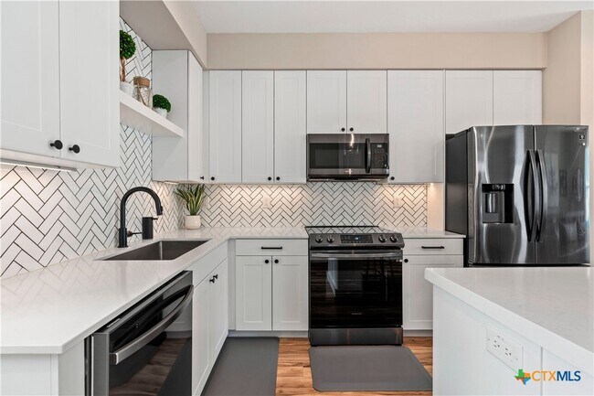 Building Photo - 1208 N Academy Ave