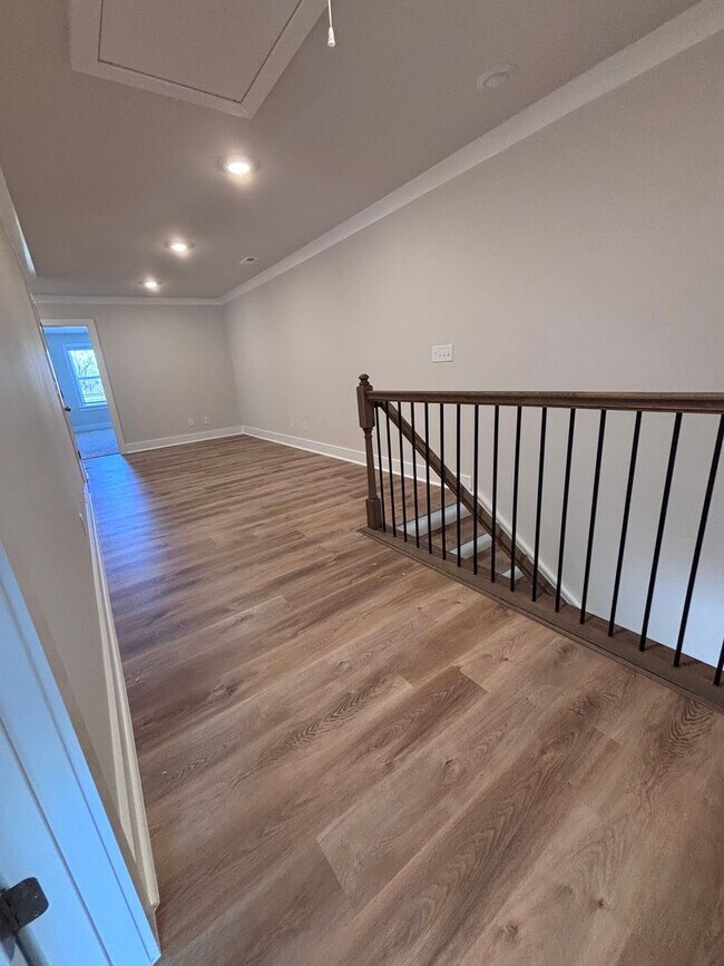 Building Photo - Brand new three-bedroom, 2.5-bath townhome