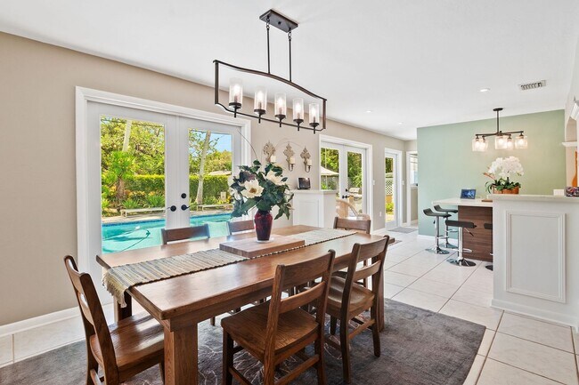 Building Photo - Stunning 4BR/3BA Pool Home with Outdoor Oa...
