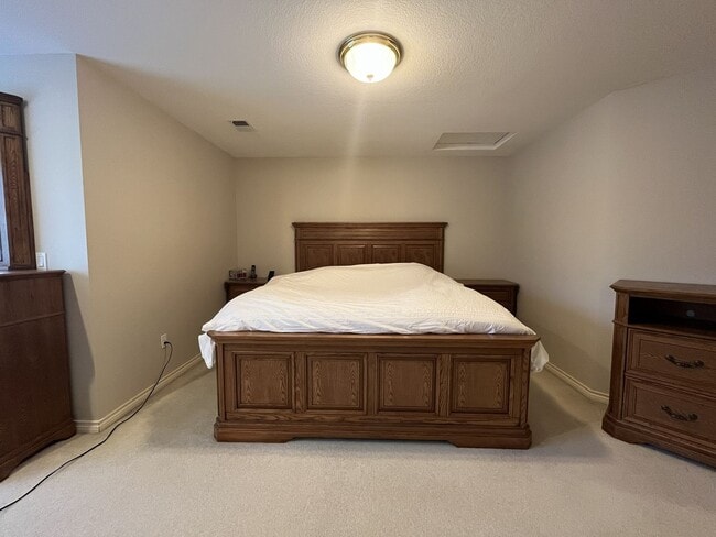 Building Photo - Executive-Style Northwest Heights Home with Forest Views and Refined Architectural Details