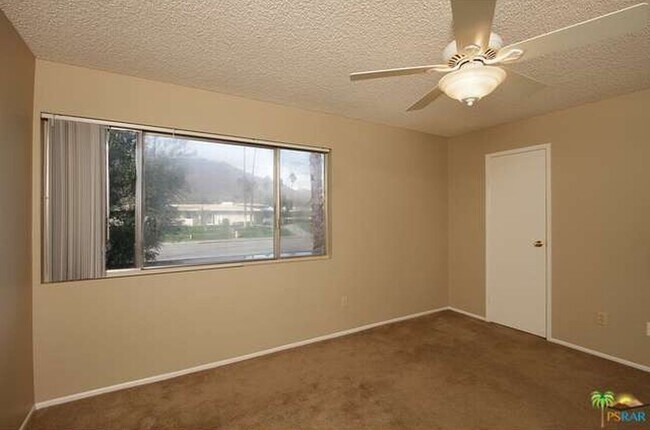 Building Photo - Spacious 4-Bedroom Condo in Indian Canyon ...