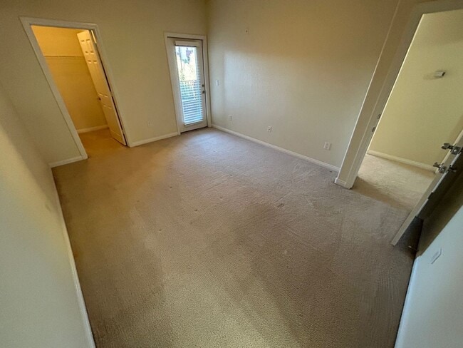 Building Photo - ADORABLE 2 BEDROOM 2 BATHROOM CONDO LOCATED IN A GATED COMMUNITY