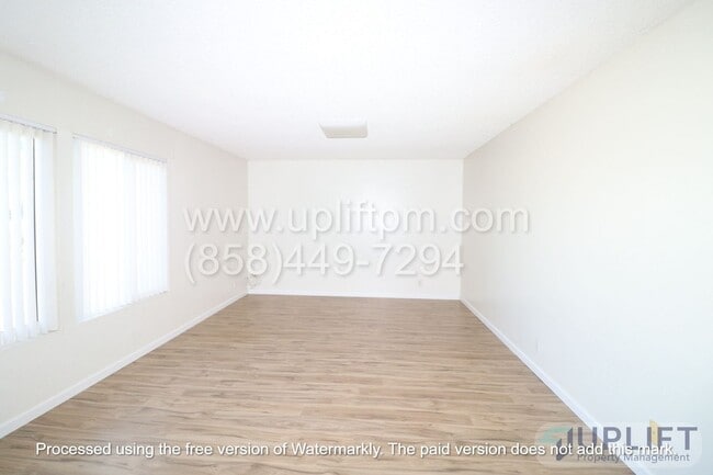 Building Photo - 4 bed, 2 Bath Home With Fenced Yard and attached 2 Car Garage