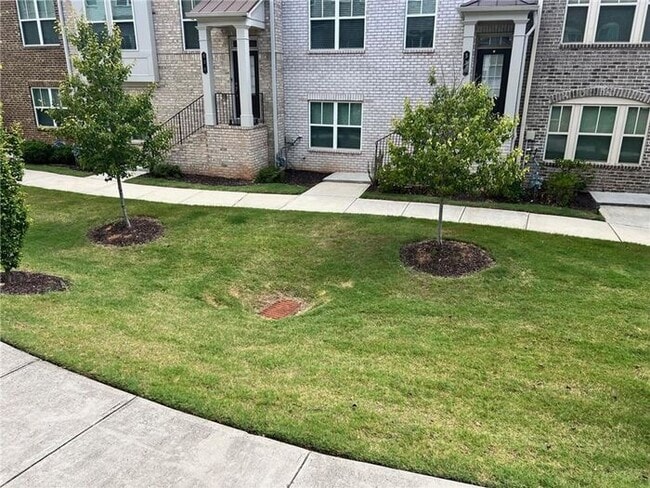 Building Photo - 4-bedroom, 3.5-bathroom townhome in Suwanee Walk!