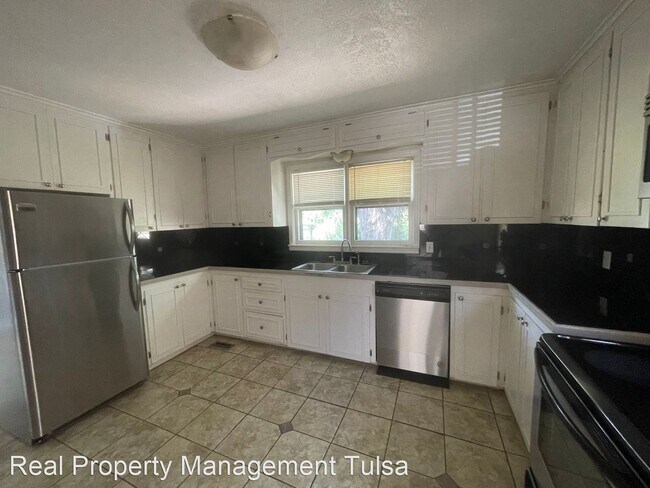 Building Photo - 3 br, 1 bath House - 5004 S Quincy Ave