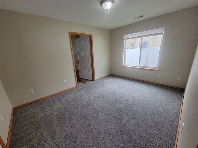 Building Photo - Comfortable 4-Bedroom Home with Fenced Bac...