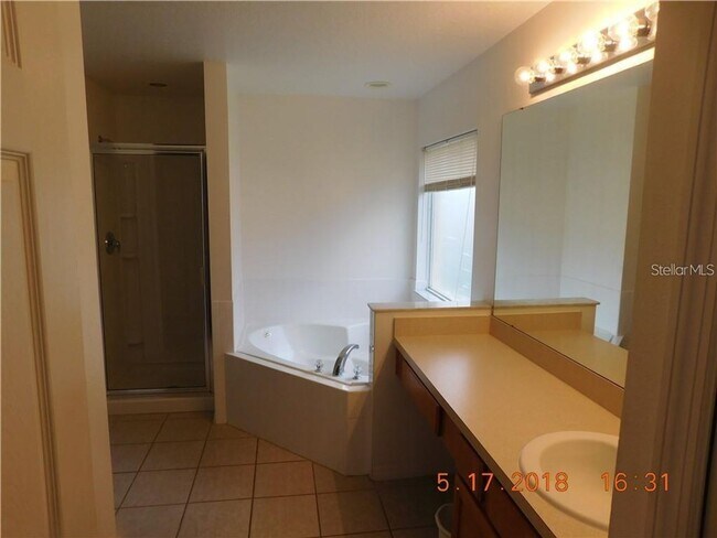 Building Photo - Coming Soon | Available Mid-July | Unfurnished Lawn Care, Pool Maintenance & Pest Control Include...