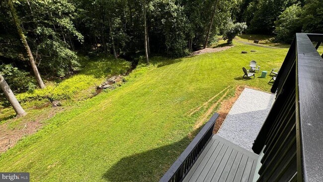 Building Photo - 10899 Woodland Falls Dr
