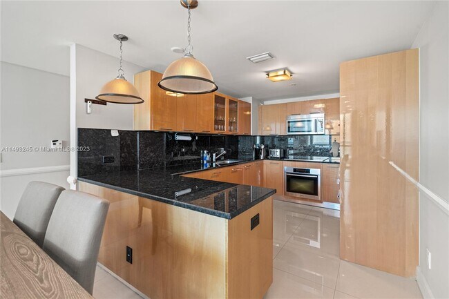 Building Photo - 6899 Collins Ave