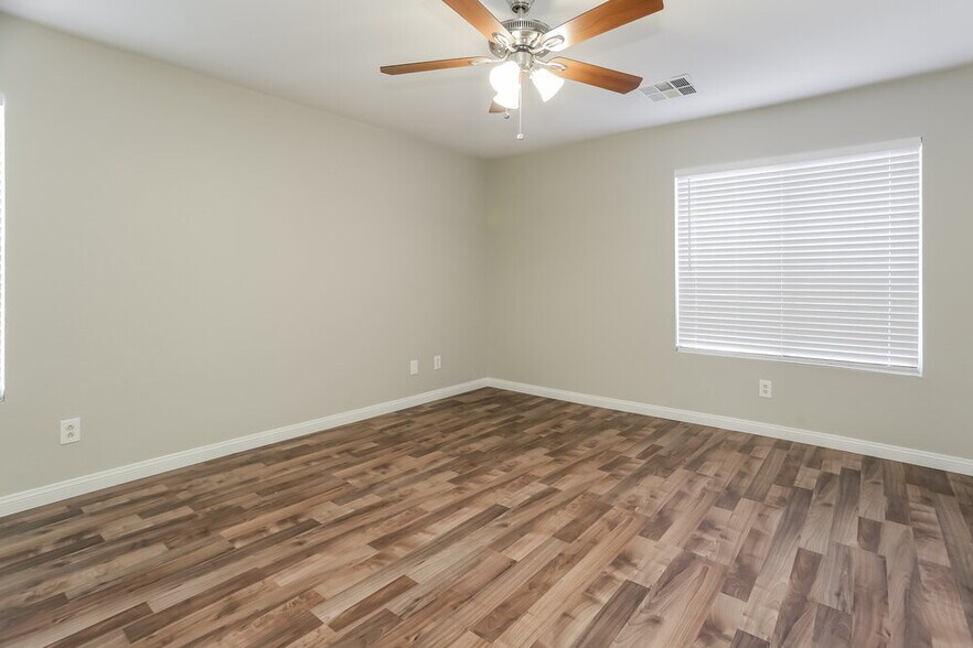 Building Photo - 8620 Hidden Pines Ave