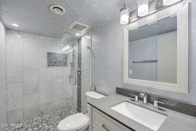 Building Photo - 6900 N Highlands Dr
