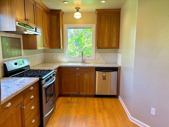 Building Photo - Spacious Montavilla Home on Corner Lot with Hardwoods, A/C, 1 Car Detached Garage, Finished Attic...