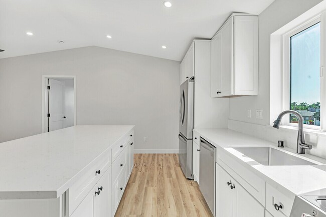 Building Photo - Beautiful new construction - lower level unit