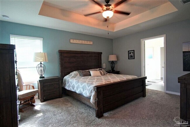 Building Photo - Popular Floor Plan, Almost New Home in Woo...