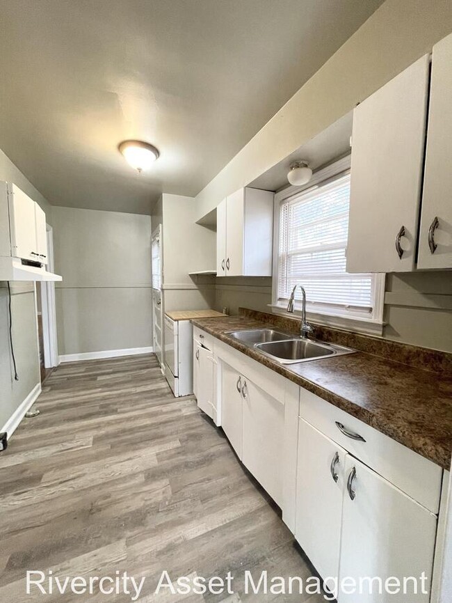 Building Photo - A Must See Duplex, Comes With New Fridge!!!!!