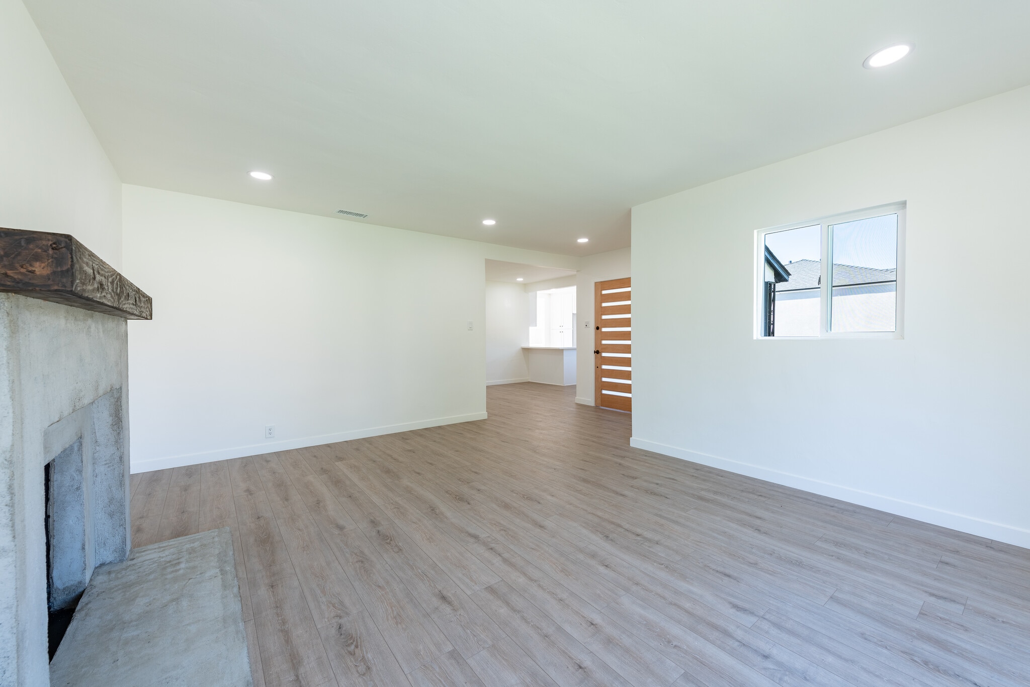 LIVING ROOM W/ VIEW TO DINING ROOM - 1011 N Florence St