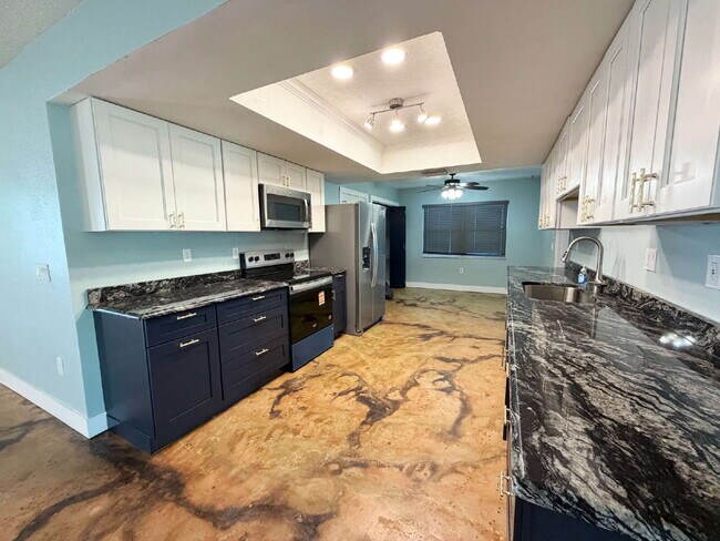 Building Photo - "Waterfront Home with Dock! 3-Bedroom Oasis with 2 Baths and 1,800 Sq Ft of Comfort in Hudson, FL!"