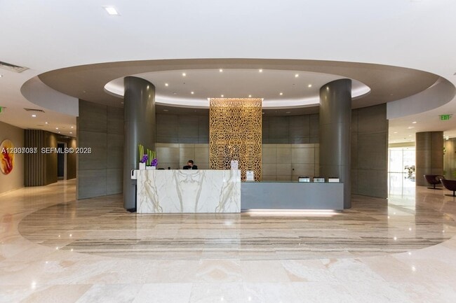 Building Photo - 10275 Collins Ave