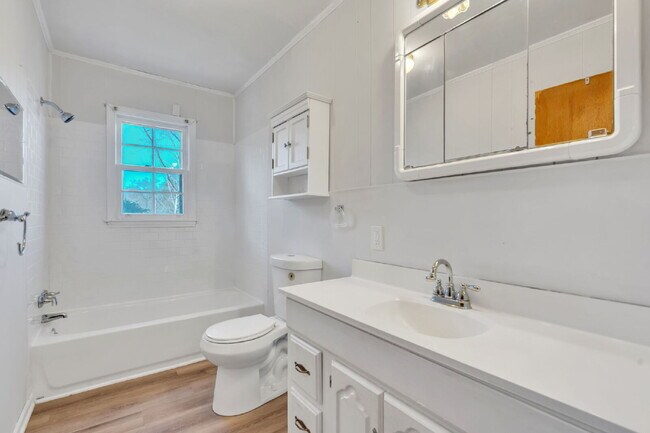 Building Photo - Well maintained 3 bedroom, 1 bath single family home with yard, carport and storage shed on quiet...