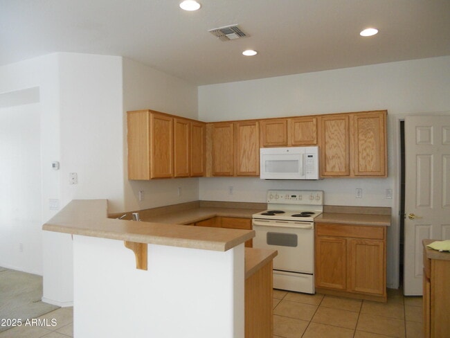 Building Photo - 13558 W Port Royale Ln