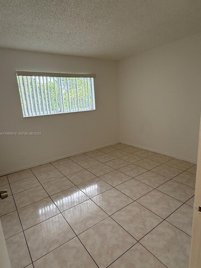 Building Photo - 8550 N Sherman Cir