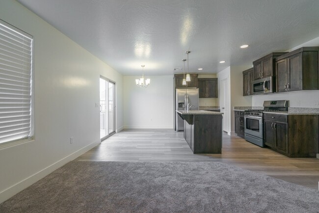 Building Photo - Modern 4-Bed Stand-Alone Home with Fenced Patio