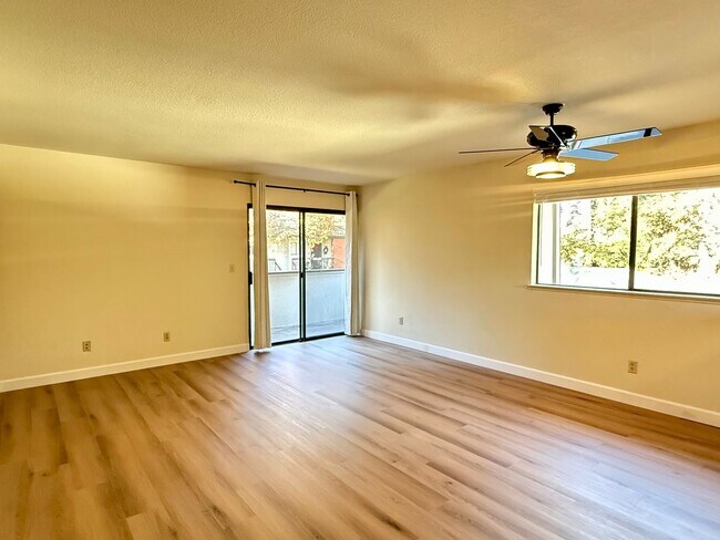 Building Photo - New Vinyl Plank Flooring, Fresh Interior Paint, 1 Car Garage + 1 Assigned Outdoor Parking Space -...