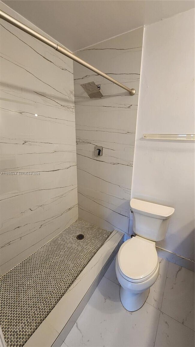 Building Photo - 3090 Coral Springs Dr