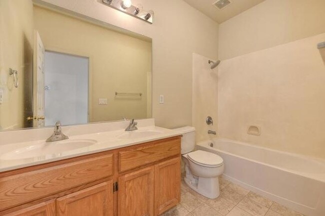 Building Photo - 4bed | 2bath | 1715SF | 2 Car Garage | Single Story | Tenant pays $190 monthly for WS&G