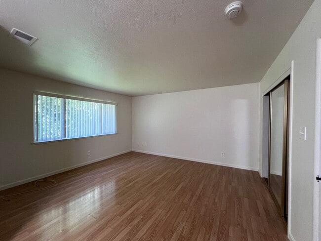 Building Photo - Freshly painted 4 bedroom home on over 2 acres of land.
